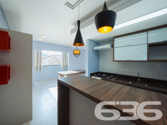 Descubra o seu próximo lar em Joinville, no coração do bairro Guanabara. Este excepcional apartamento, oferece um refinamento sem igual, proporcionando espaço e conforto para toda a família. Com uma garagem coberta e estrategicamente localizado, este imóvel representa uma oportunidade única para quem busca qualidade de vida e valorização imobiliária.

Este magnífico apartamento possui uma área construída, com uma arquitetura que aproveita cada metro quadrado para garantir um espaço amplo e funcional. Composto por 2 dormitórios sendo uma suíte, o imóvel destaca-se pelos acabamentos de primeira linha e pelos móveis planejados, desenhados por arquiteto, que agregam elegância e praticidade ao ambiente.

A sala de estar e jantar é um convite ao bem-estar, com uma iluminação natural intensa que realça as cores suaves das paredes e o design moderno dos móveis. A cozinha, integrada à copa, é um verdadeiro destaque com armários sob medida, bancadas em granito e modernos equipamentos que atendem todas as necessidades culinárias. Além disso, a sacada com churrasqueira é o espaço ideal para momentos de lazer e descontração, oferecendo uma vista encantadora do bairro.

Cada detalhe deste apartamento foi pensado para garantir o máximo de conforto e funcionalidade, incluindo a presença de uma garagem coberta, acesso à internet de alta velocidade e a permissão para animais de estimação, garantindo que toda a família possa desfrutar deste belo espaço.

Situado em uma rua pavimentada e tranquila, cercado por residências de alto padrão, o imóvel está a poucos passos de importantes vias de acesso, escolas, hospitais, centros de compras e muito mais. 

Este apartamento não é apenas um lugar para morar, é um investimento em uma vida de qualidade e conforto. Convidamos você a conhecer e se apaixonar por este imóvel excepcional em Joinville, um local pronto para ser o seu novo lar. Venha viver essa experiência com a 636 Negócios Imobiliários, onde grandes pessoas constroem grandes sonhos. Venha para a 636!
 
636 NEGÓCIOS IMOBILIÁRIOS: A SUA MELHOR ESCOLHA
Com mais de 30 anos de experiência, a 636 Negócios Imobiliários é sua parceira ideal para encontrar o imóvel perfeito. Estamos prontos para ajudá-lo a fazer deste imóvel o seu novo lar.
 
Telefone: (47) 3451-0636
WhatsApp: (47) 99190-0636
 
Não perca esta oportunidade única. Visite nosso site para mais informações: i636.com.br